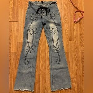 Delia's flared butterfly jeans